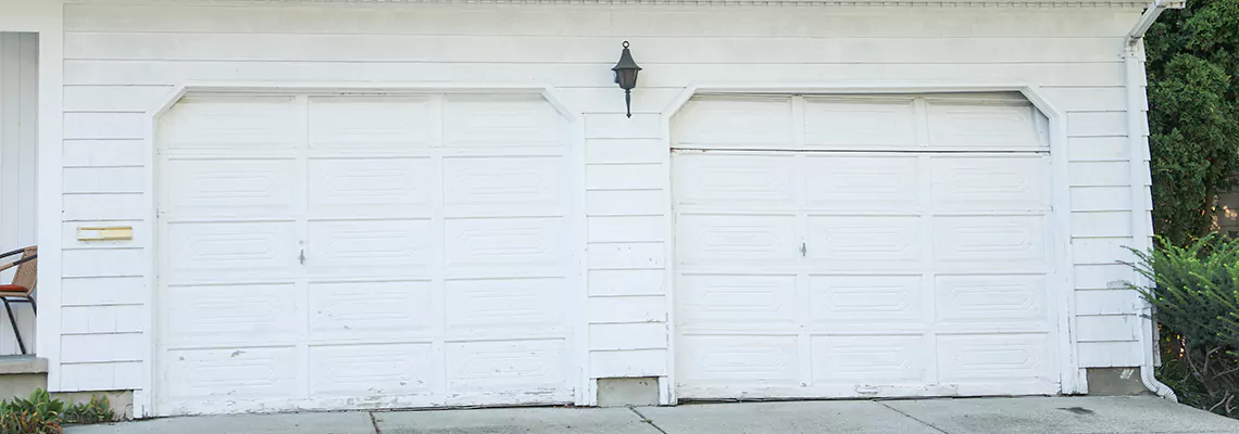 Roller Garage Door Dropped Down Replacement in Winnipeg, MB