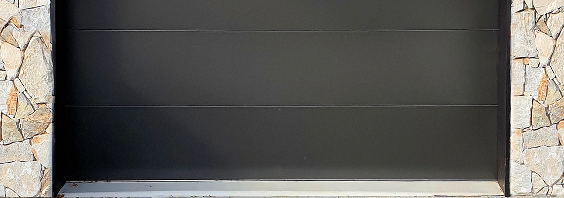 Overhead Black Garage Door Installation in Winnipeg, Manitoba