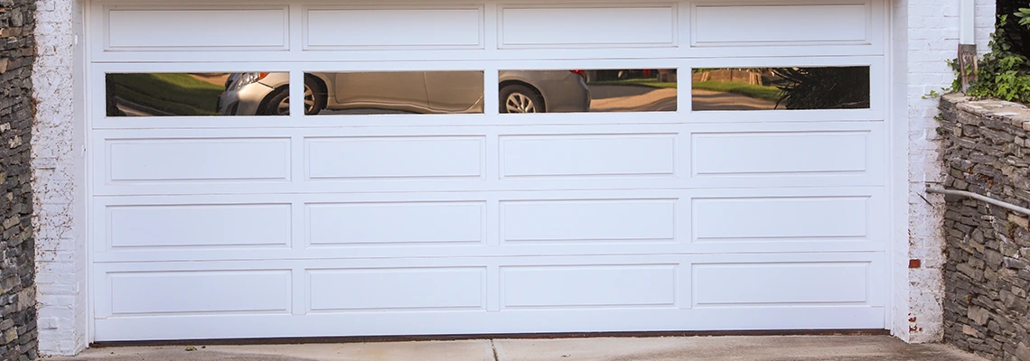 Wood Garage Door Bang Sound Repair in Manitoba