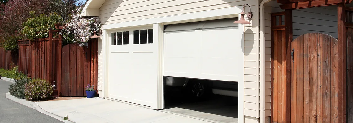 Fix Metal Garage Door Jerking in Winnipeg, Manitoba